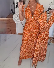 Elegantné šaty s leopardím vzorom a výstrihom do V