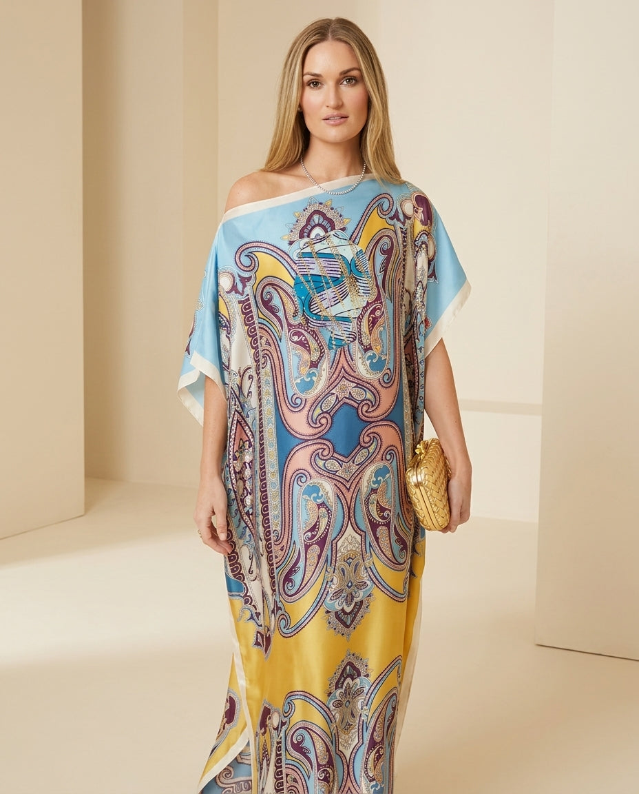 Light Blue Whisper Resort Printed Romper Light Blue Romper with Relaxed Fit silhouette and Satin texture, front view product image for Resort Wear, Sunset in Malibu, US Coastal Glam by Mesadic