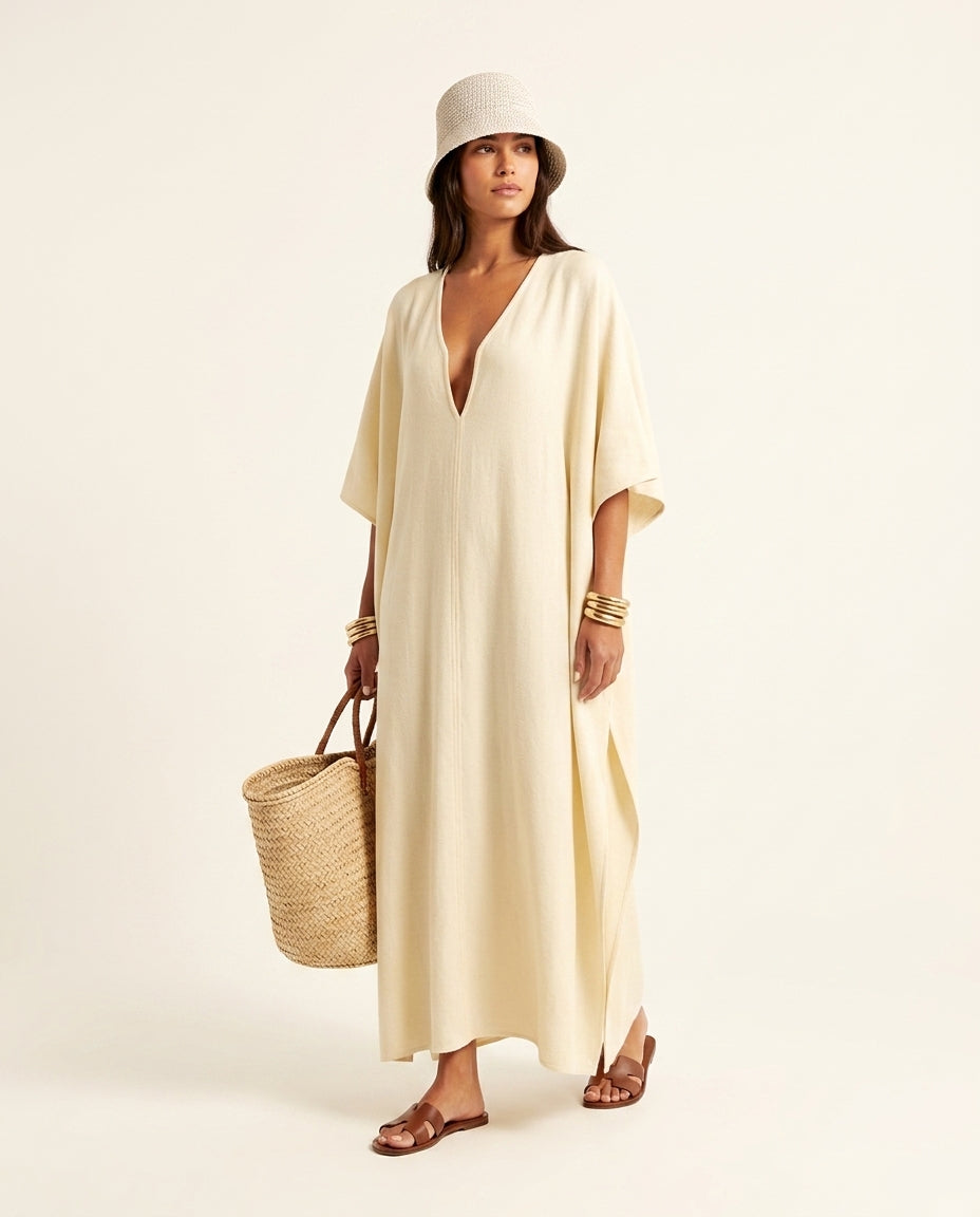 Ivory Lustre Resort V-Neck Maxi Dress Ivory Maxi Dress with Asymmetric silhouette and Ribbed Knit texture, clean studio product view for Resort Wear, a polished coastal brunch, US East / Hamptons Elite by Mesadic
