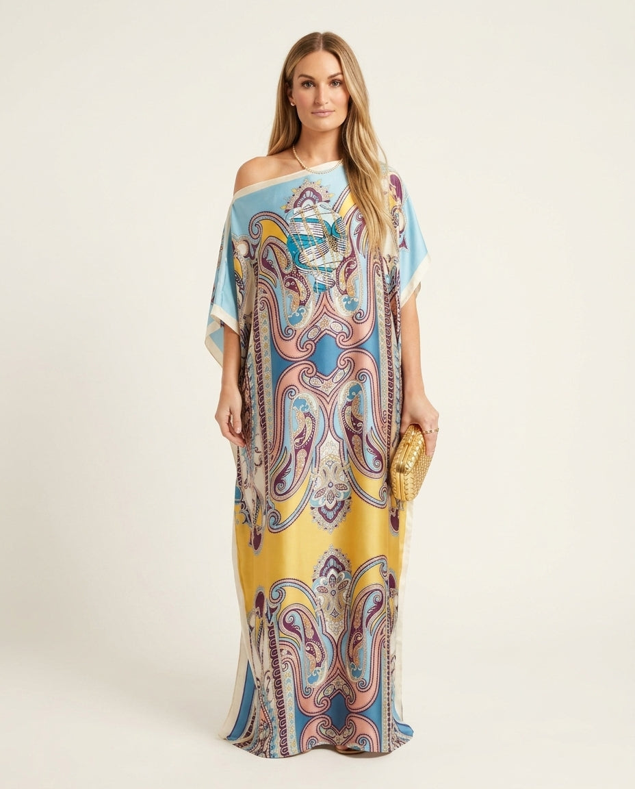Light Blue Whisper Resort Printed Romper Light Blue Romper with Relaxed Fit silhouette and Satin texture, clean studio product view for Resort Wear, Sunset in Malibu, US Coastal Glam by Mesadic