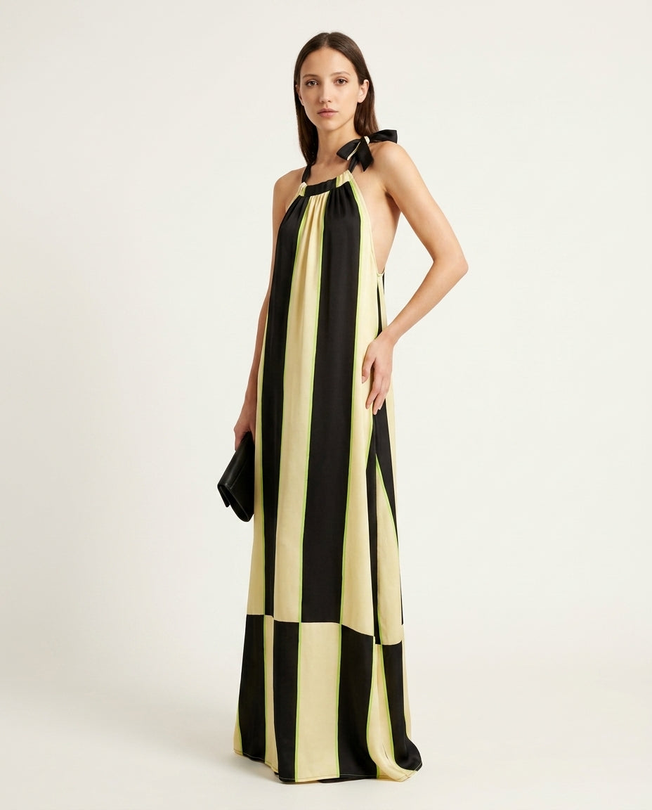 Black Grace Resort Striped Romper Black Romper with Relaxed Fit silhouette and Satin texture, side or back garment view for Resort Wear, an estate dinner at golden hour, US East / Hamptons Elite by Mesadic