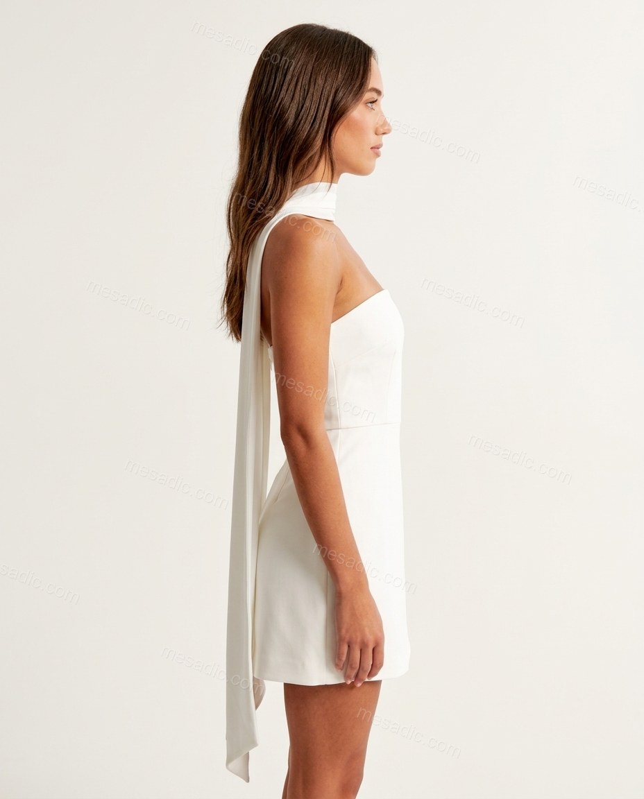 White Mini Strapless Dress, side and back studio view showing the flowing sash drapes down the back from the neck, by mesadic.com