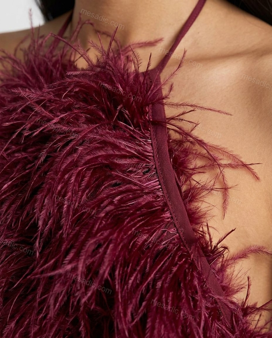 Burgundy Mini Open-Back Halter Dress, close-up of halter neck tie closure, open back and all-over feather embellishment, by mesadic.com