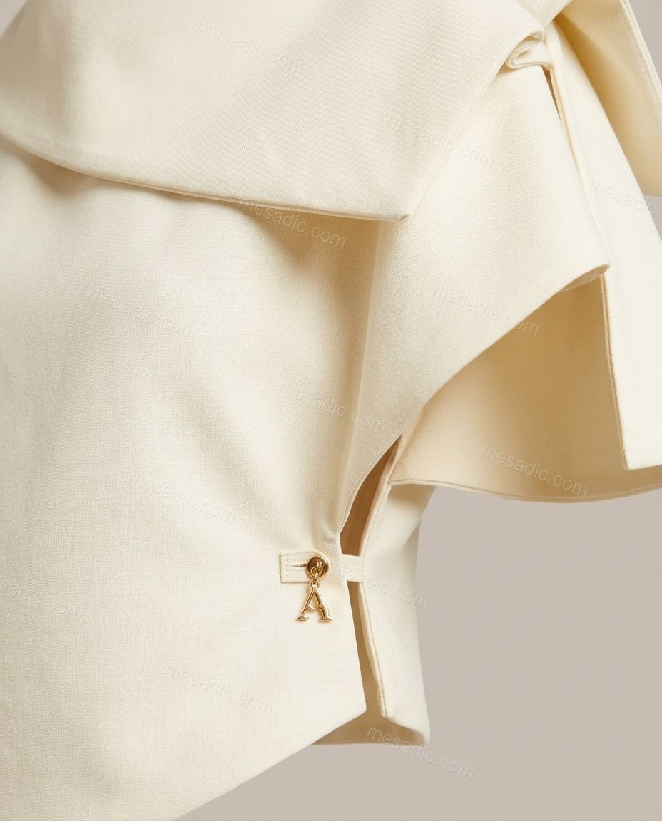 Cream Top & Shorts Set, close-up of draped collar, flutter sleeves and cropped length, by mesadic.com