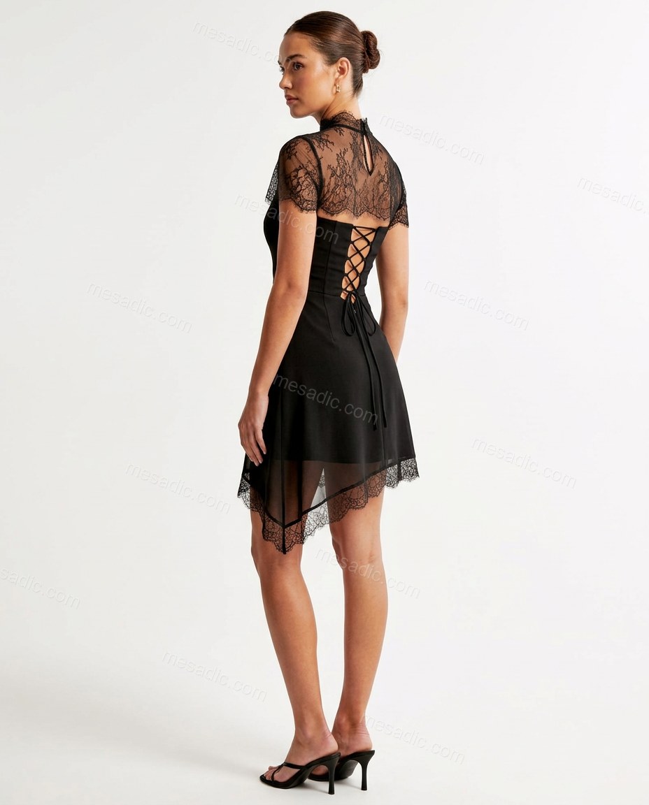 Black Mini Lace Dress, back studio view showing lace-up back with exposed skin, by mesadic.com