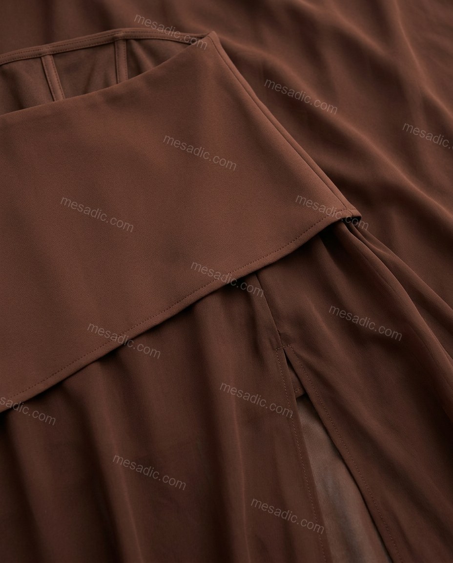 Brown Maxi Strapless Asymmetric Dress, close-up of high slit, asymmetrical overlay bodice and strapless design, by mesadic.com