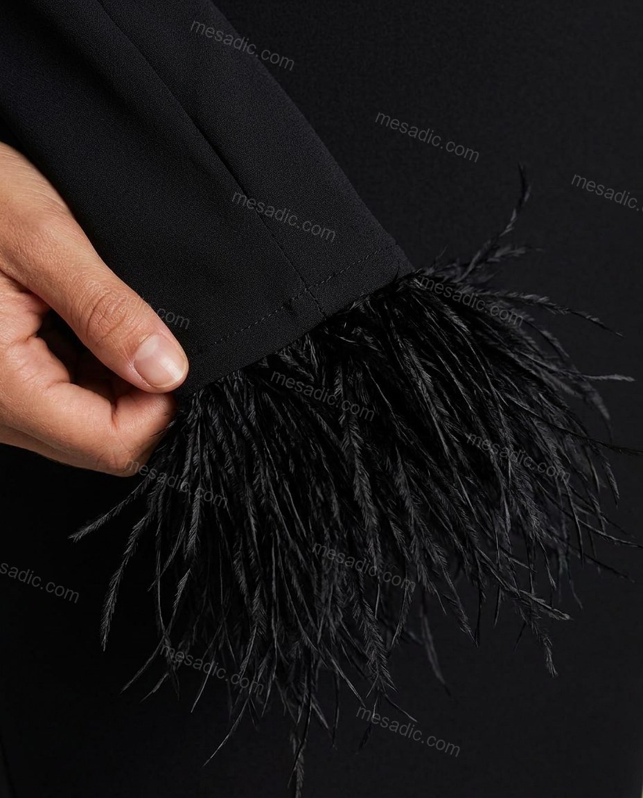 Black Open-Back Feather-Trim Knit Dress, close-up of feather cuffs, open back and long sleeves, by mesadic.com