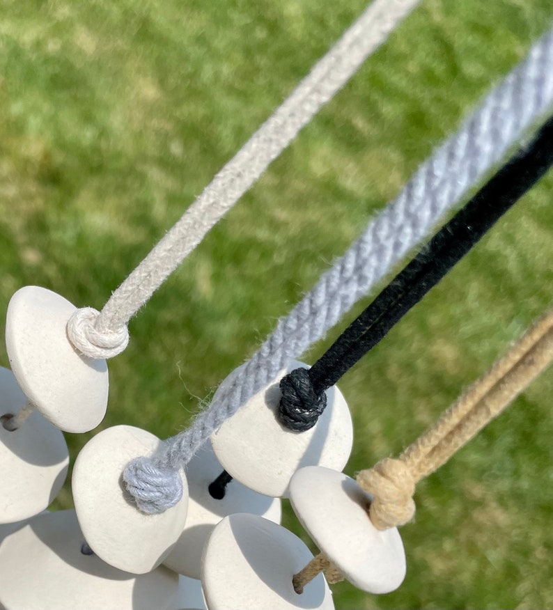 Ceramic Wind Chime Spinner Creamy White Disks 32-36 Inch Long