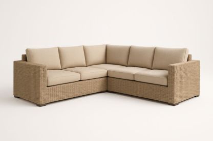 Divano angolare in resina intrecciata con cuscini in tessuto beige