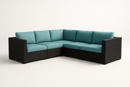 Divano angolare modulare in rattan sintetico con cuscini in poliestere turchese
