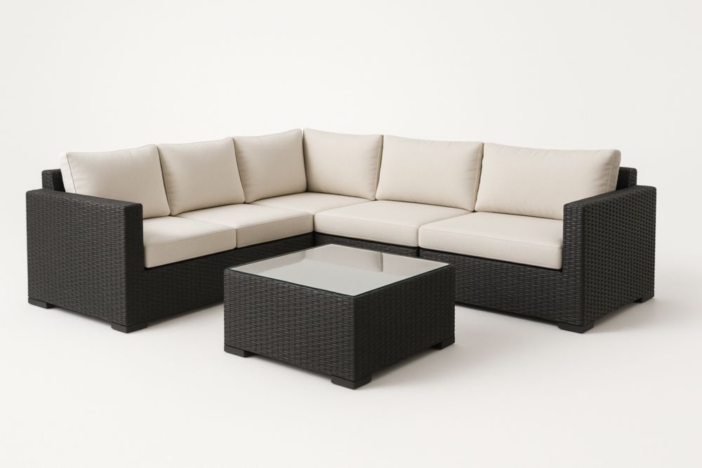 Divano angolare in rattan sintetico con tavolino in vetro temperato