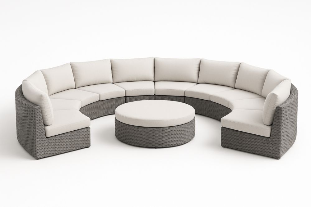 Divano angolare modulare in rattan grigio con cuscini beige e tavolino rotondo