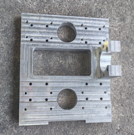 Cast aluminum plates on the upper and lower sections of the right arm