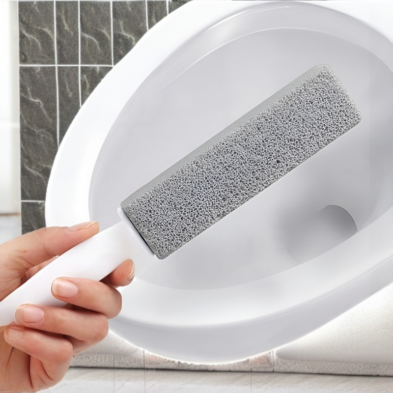 Close-up of pumice stone head on toilet brush