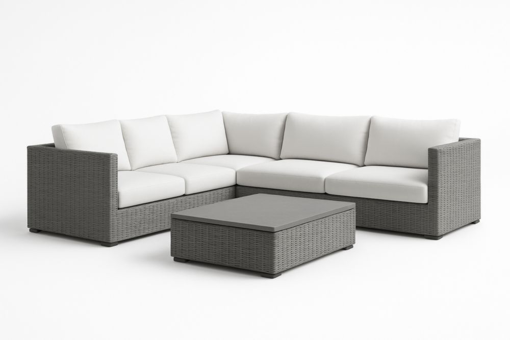 Divano angolare modulare in rattan sintetico con tavolino grigio e cuscini bianchi