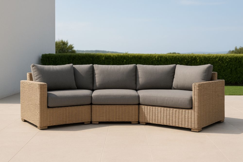 Divano angolare in rattan sintetico con cuscini grigi