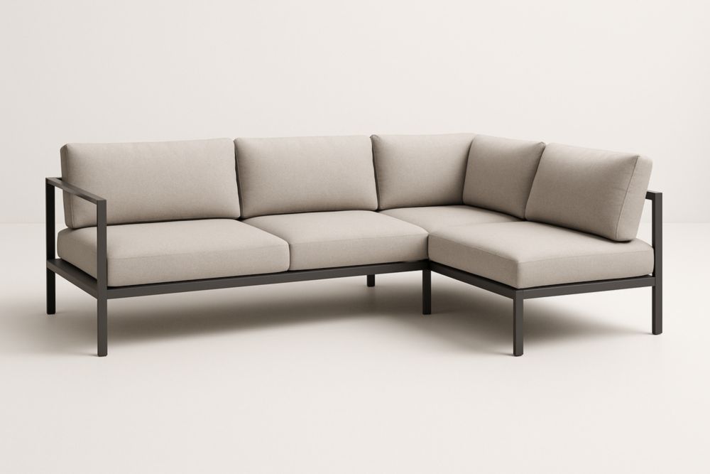 Divano angolare in alluminio e tessuto beige con cuscini