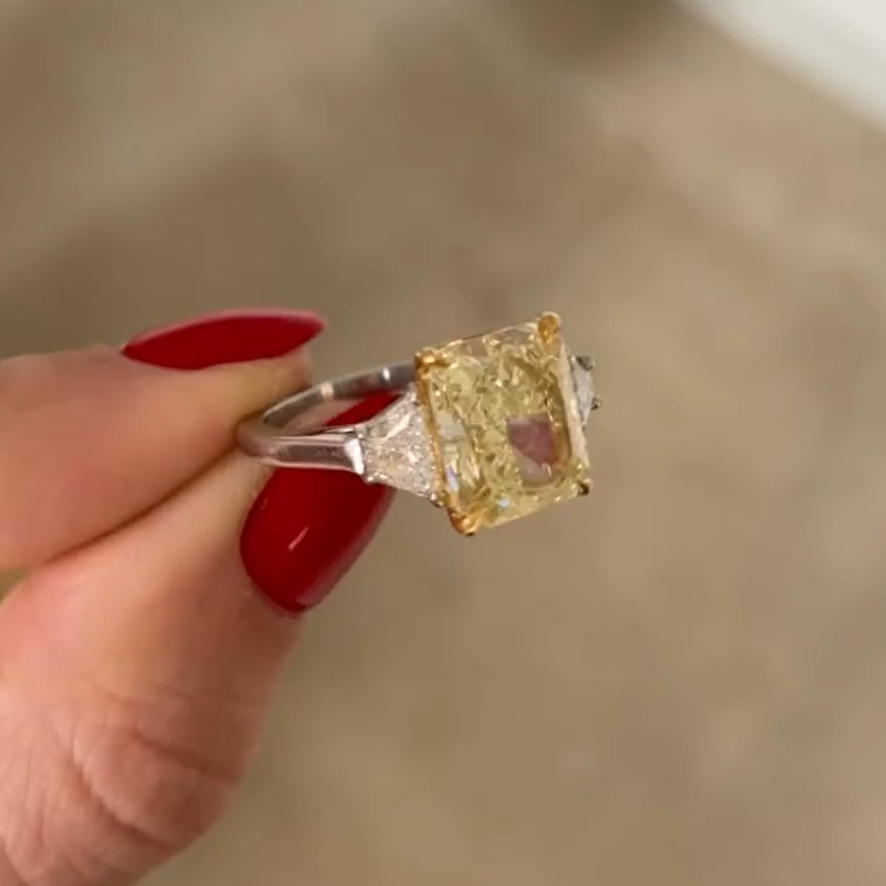 2.83 Carats Oval Shaped Fancy Intense Yellow Diamond Ring