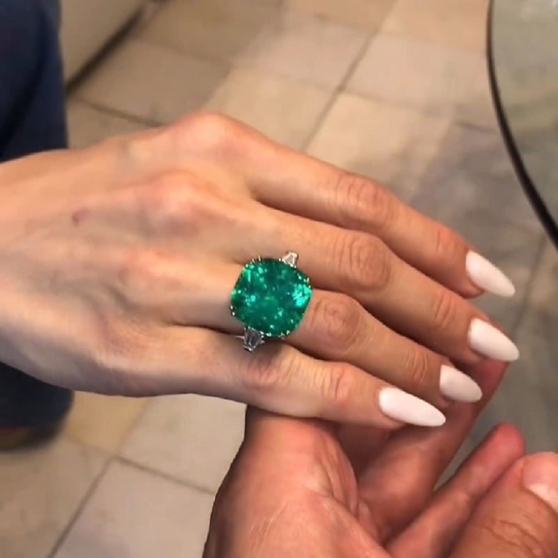21.0 Carats Cushion Cut Emerald & Diamond Three-Stone Halo Ring