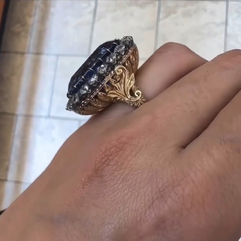 19.5 Carats Radiant Cut Ceylon Sapphire Halo Ring