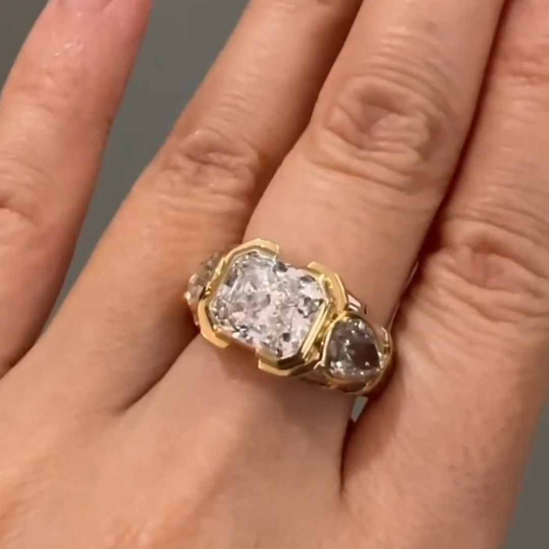 3.11ct Radiant Cut White Stone Ring with Pear Shape Sidestones