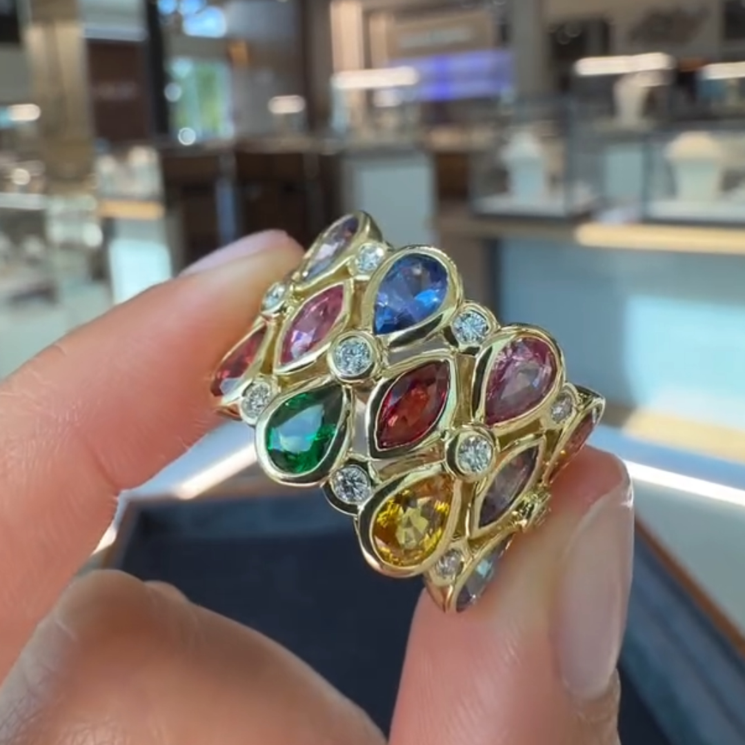 7.95ctw Pear & Marquise Cut Rainbow Eternity Ring