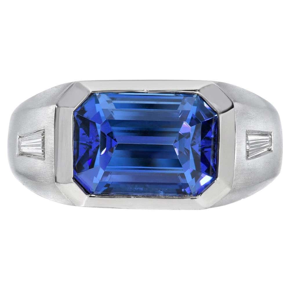 6.58 Carat Tanzanite Blue Emerald Cut Ring with Tapered Baguette Stone