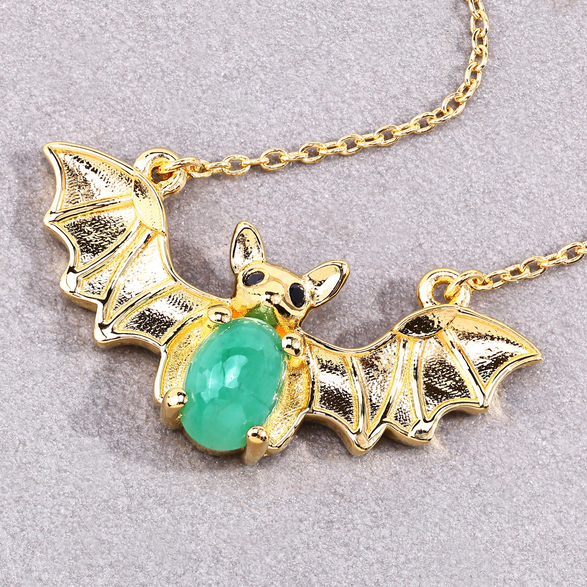 1.06 Emerald Bat Necklace With Black stone 