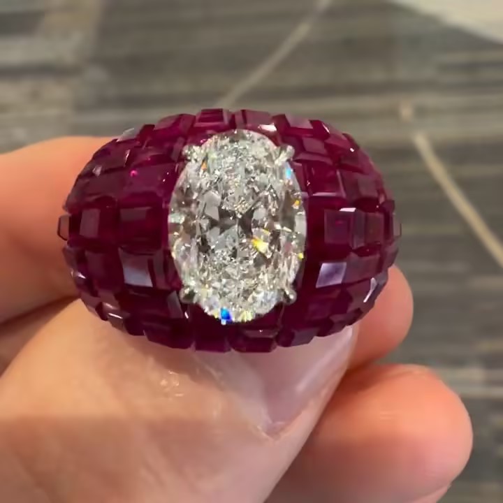 3ct Oval Cut Cocktail Ring Nestled Seamlessly in Invisible Set Rubies