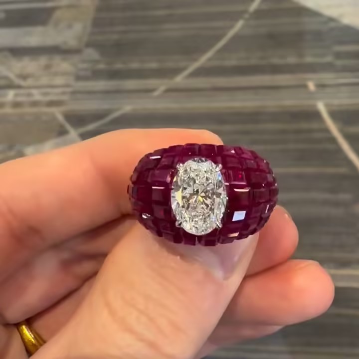 3ct Oval Cut Cocktail Ring Nestled Seamlessly in Invisible Set Rubies