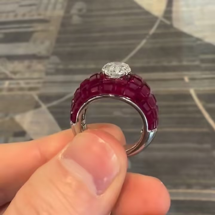 3ct Oval Cut Cocktail Ring Nestled Seamlessly in Invisible Set Rubies