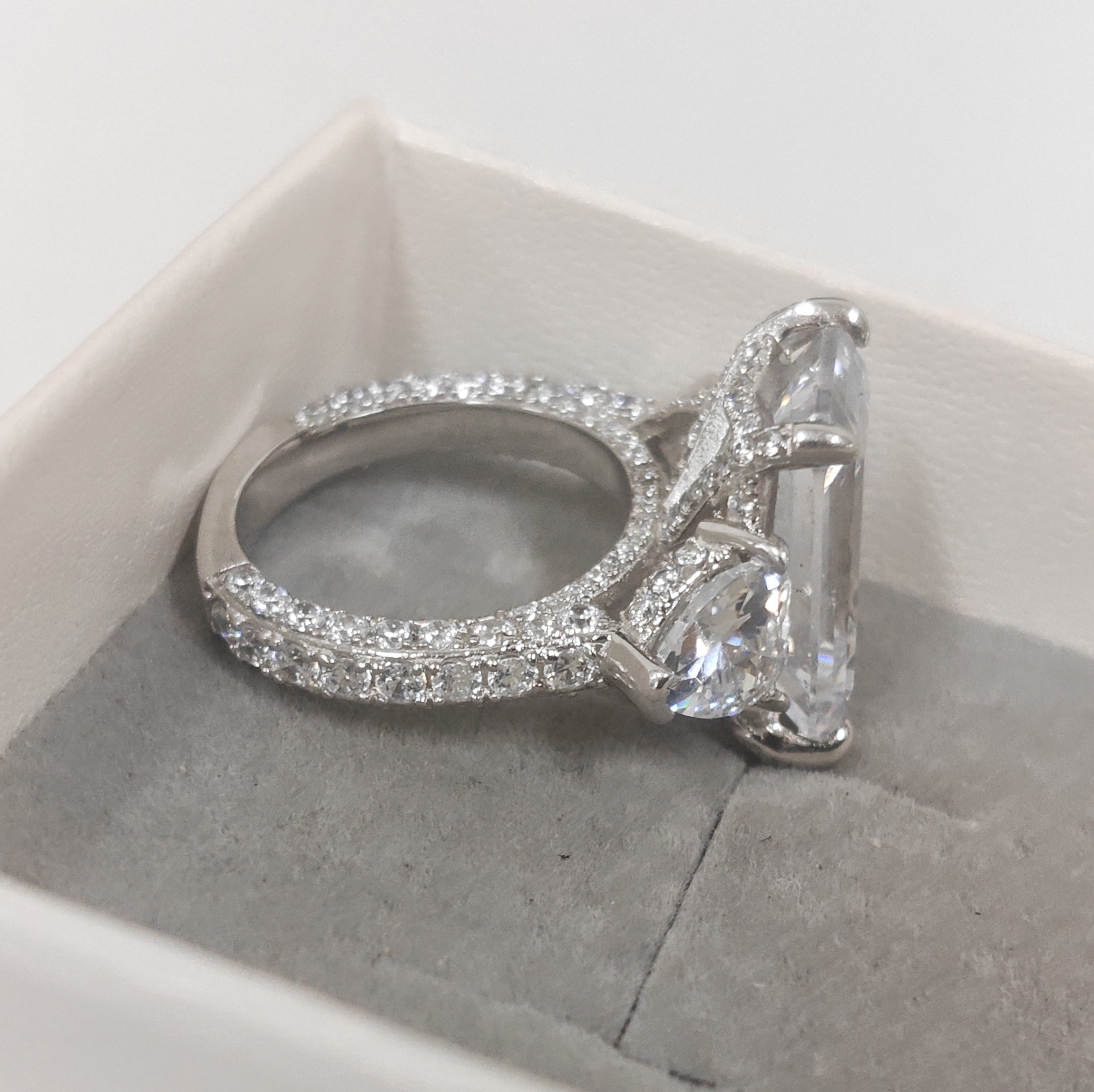 Three-stone Design 7ct Emerald Cut White Stone Ring