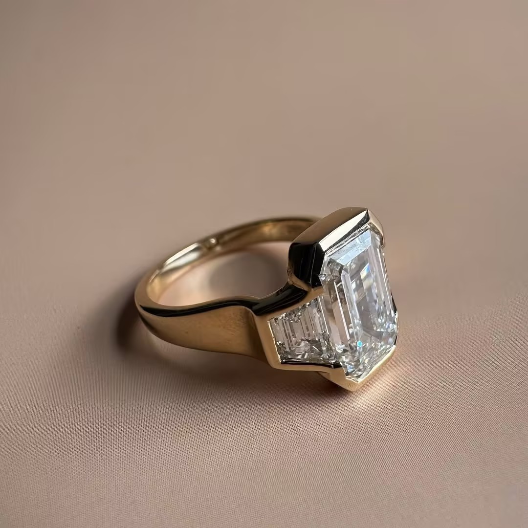 Contemporary Three-stone Elongated Emerald Cut White Stone Ring