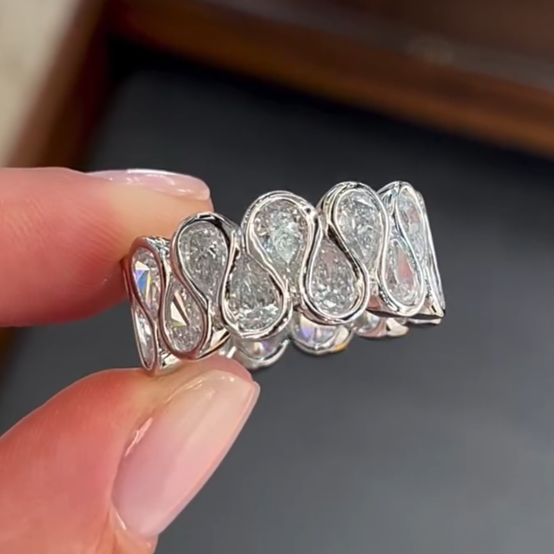 Infinity Sign Design Pear Cut White Stone Wedding Band