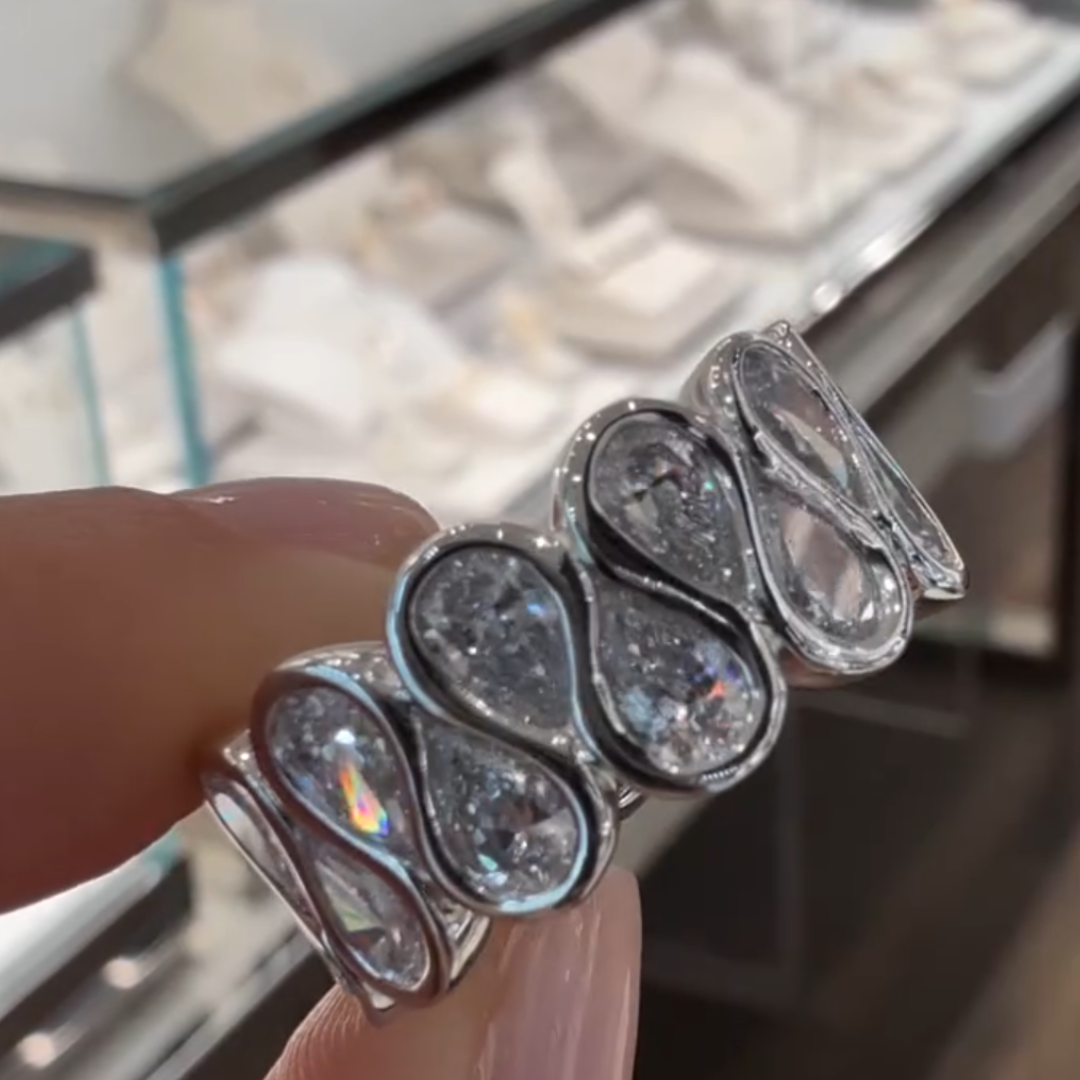Infinity Sign Design Pear Cut White Stone Wedding Band