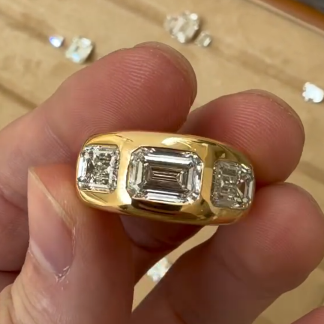 East-west Design Emerald Cut Three-stone Cigar Band Ring