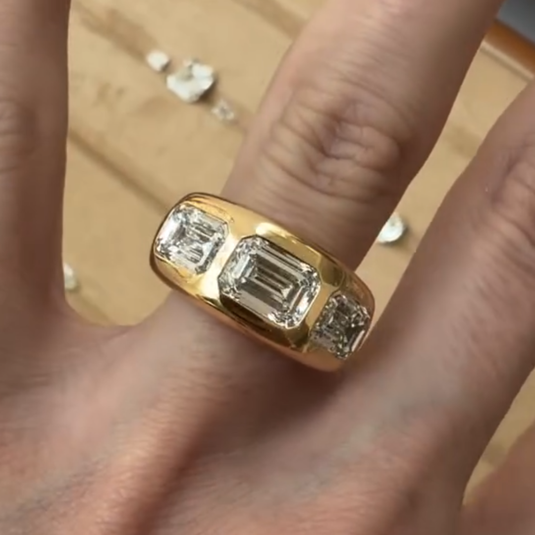 East-west Design Emerald Cut Three-stone Cigar Band Ring