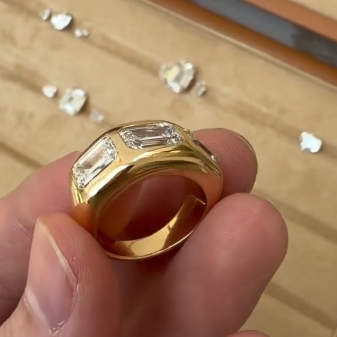 East-west Design Emerald Cut Three-stone Cigar Band Ring