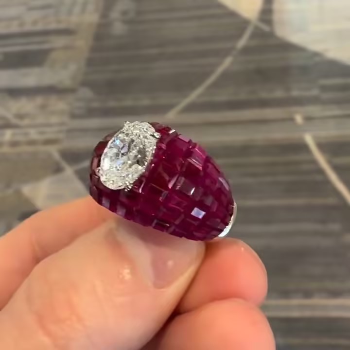 3ct Oval Cut Cocktail Ring Nestled Seamlessly in Invisible Set Rubies