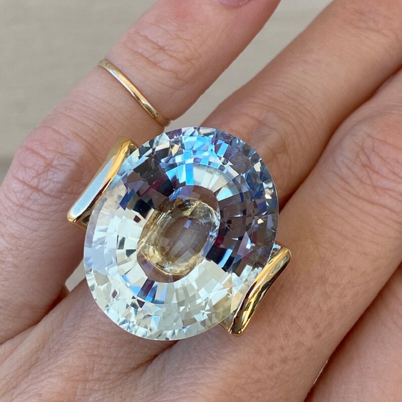 56.8 Carat Fine Quality Impressive Step Cut Oval Blue Topaz Ring