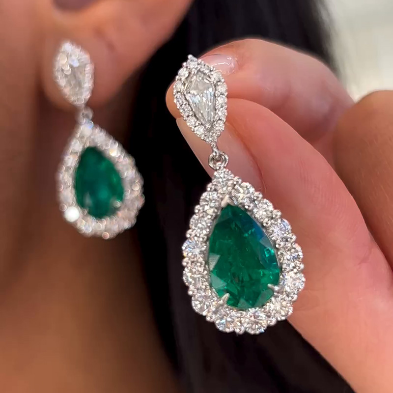 10ctw Pear Cut Emerald With A Round Cut White Sapphire Halo Handmade Drop Earrings