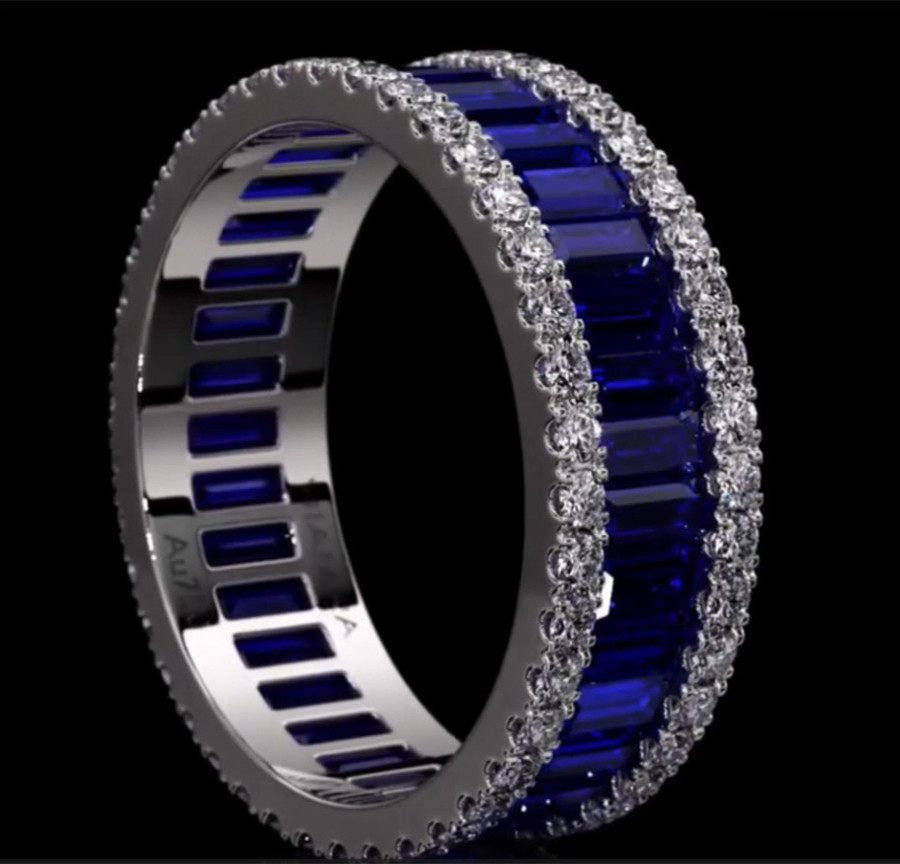 6.25ct Emerald Cut Blue Zircon Eternity Ring
