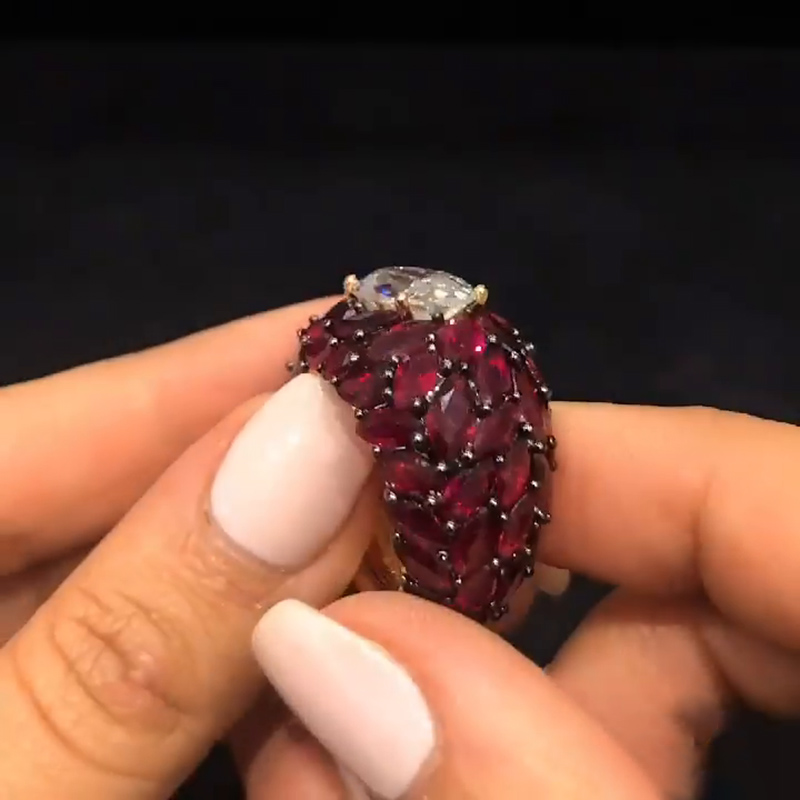 5ct Oval Cut With A Dome of Marquise Cut Rubies Cocktail Ring