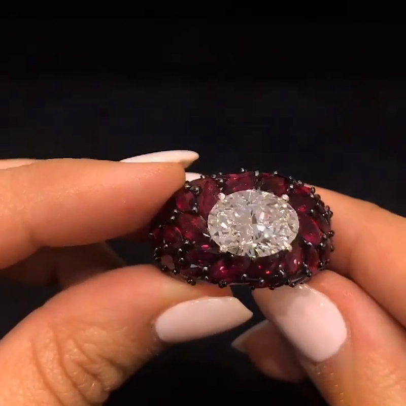 5ct Oval Cut With A Dome of Marquise Cut Rubies Cocktail Ring