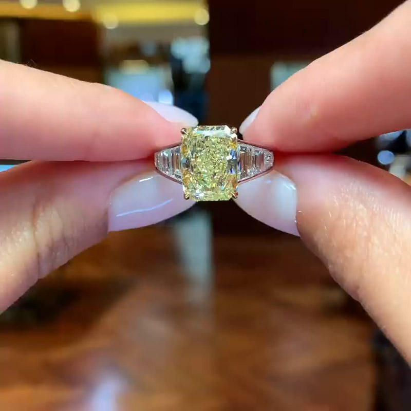 5ct Emerald Cut Yellow Sapphire With Geometric Trapeze Side Diamonds Two Tone Engagement Ring