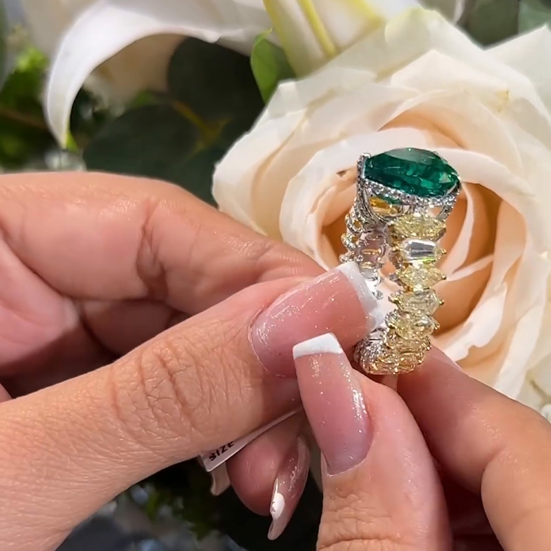 4.5ct Heart Cut Emerald With Kite And Marquise Cut White And Yellow Sapphires Eternity Band Ring