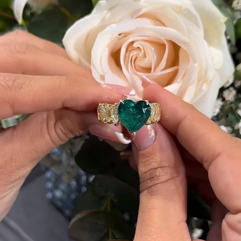 4.5ct Heart Cut Emerald With Kite And Marquise Cut White And Yellow Sapphires Eternity Band Ring