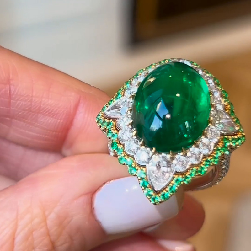 13.35ct Oval Cabochon Emerald Set Within A White Sapphire Surround Handmade Ring