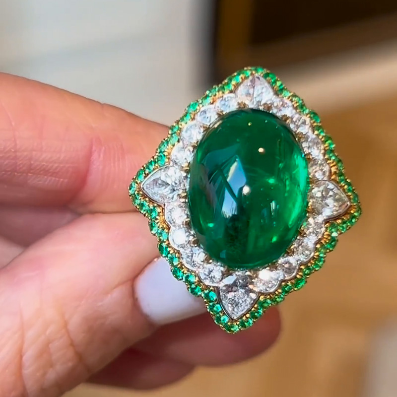 13.35ct Oval Cabochon Emerald Set Within A White Sapphire Surround Handmade Ring