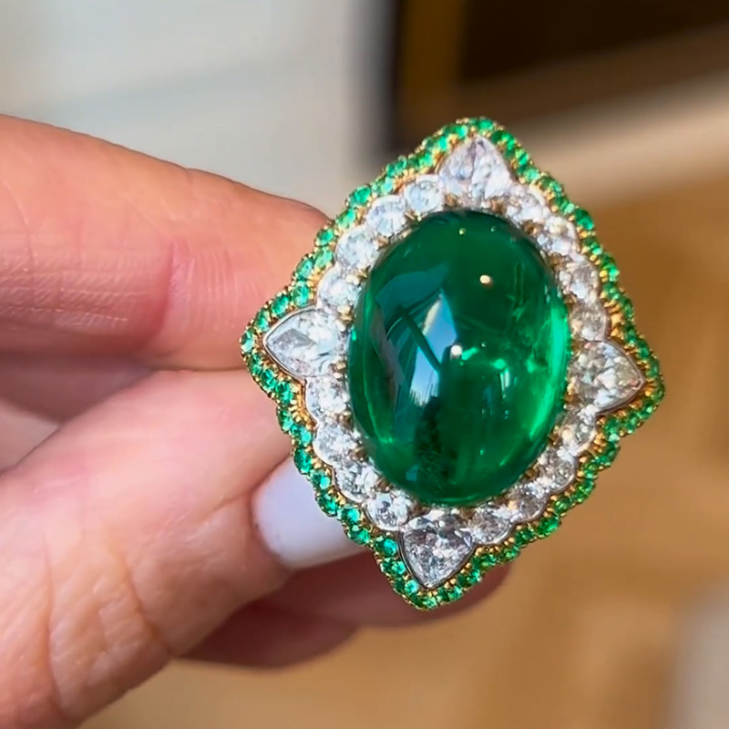 13.35ct Oval Cabochon Emerald Set Within A White Sapphire Surround Handmade Ring